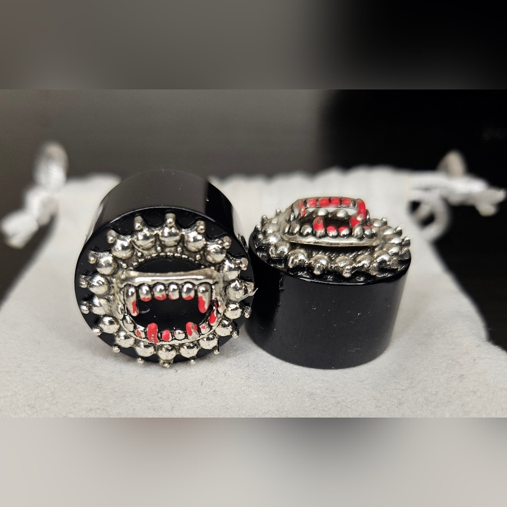 Bloody fangs plugs